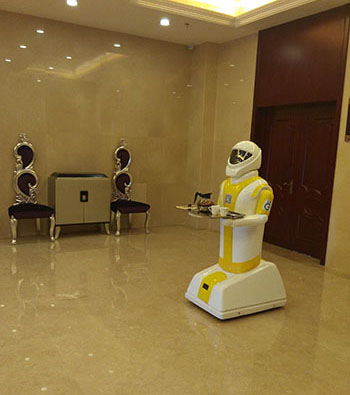 硅智送餐�C器人�M�v前程酒店